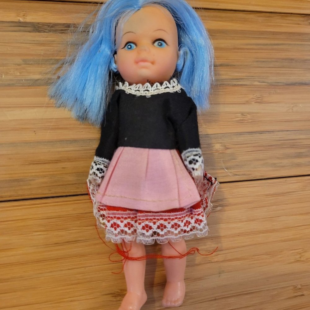 vintage doll with blue hair